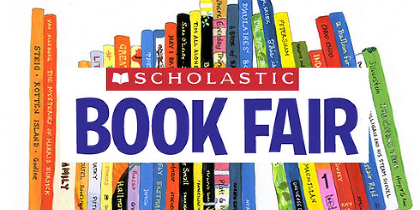 books lined up with scholastic book fair banner across it