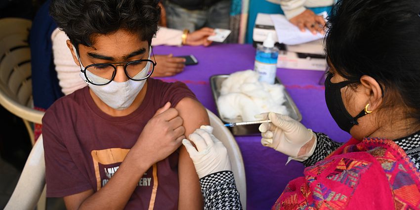 student receiving injection