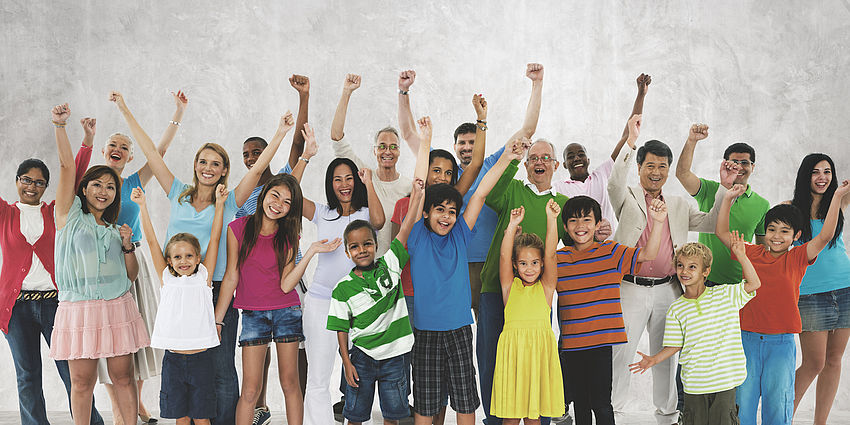 large group of diverse men, women and children