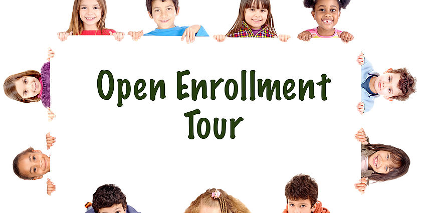 Young kids around a sign saying Open Enrollment Tour
