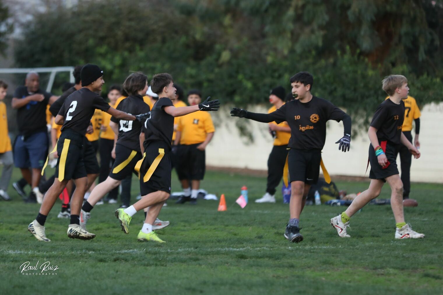 Students playing flag football