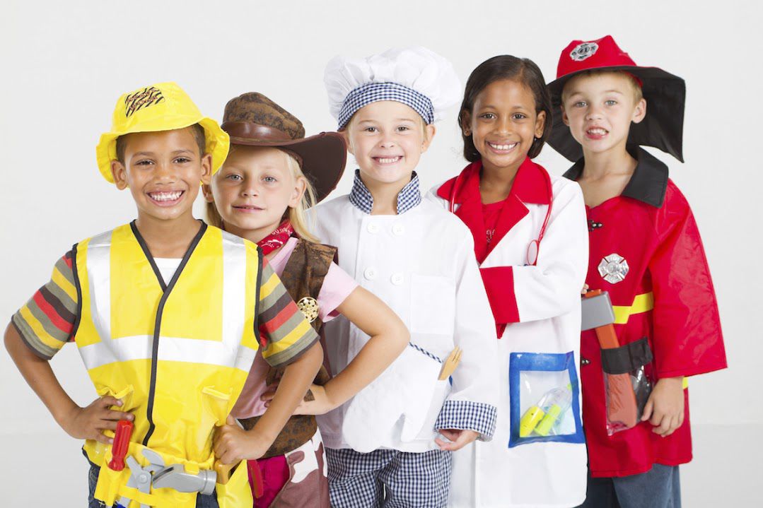 5 children dressed in different costumes 